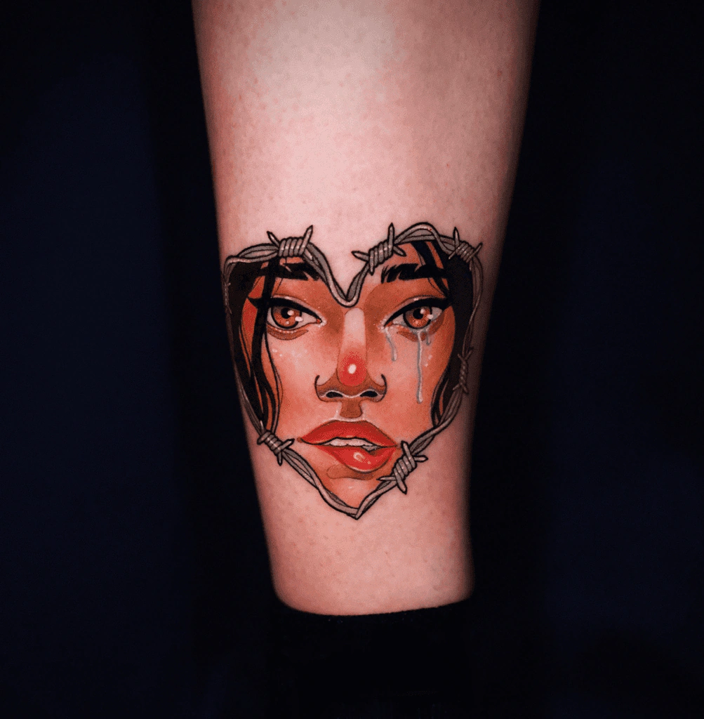Kolorowy, neotradycyjny tatuaż portret na nodze, wykonany przez Dorotę z Ashi Tattoo